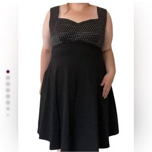 Black party dress with silk polka dot upper and sweetheart neckline